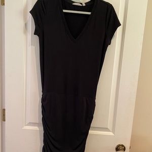 Fitted next to body black dress